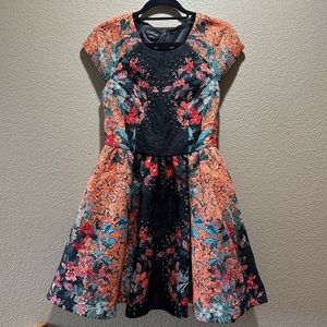 Bebe Multi-color Jacquard skater dress.